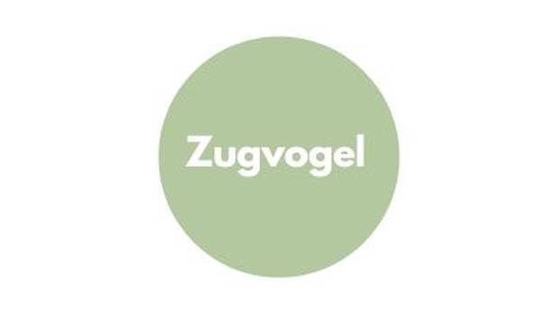 grüner Kreis mit der Aufschrift "Zugvogel"